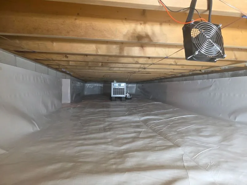 Crawl space dehumidifier and ventilation fan installed