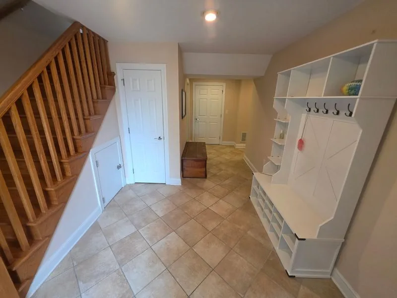 Interior basement painting with custom built-in cabinetry Sussex County Delaware