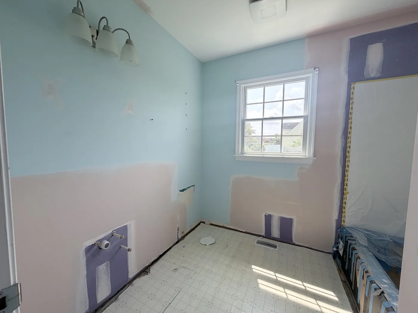 Wall finishing and compound work before paint in a Dagsboro DE bathroom remodel